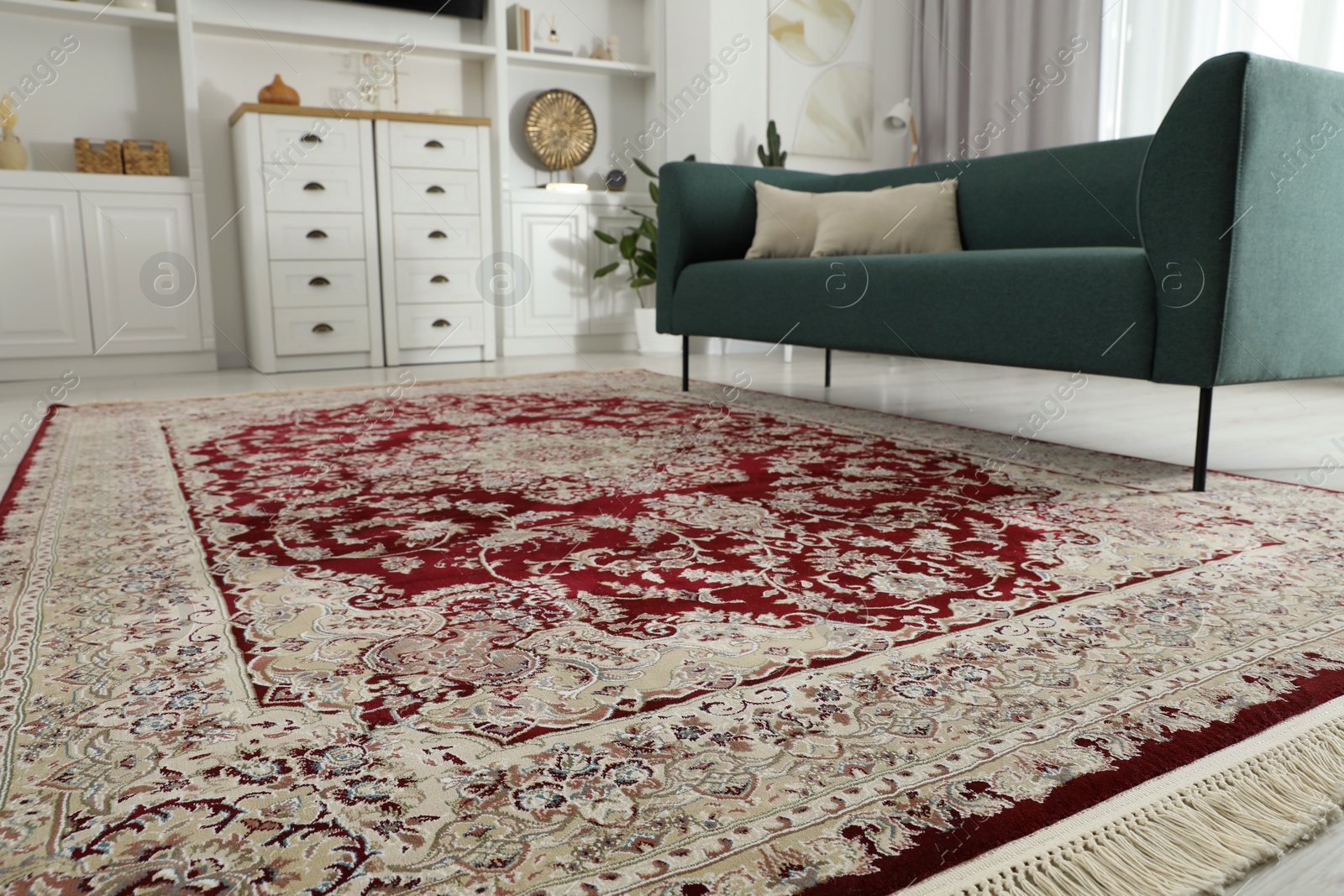 Photo of Stylish living room with beautiful carpet and furniture, closeup. Interior design