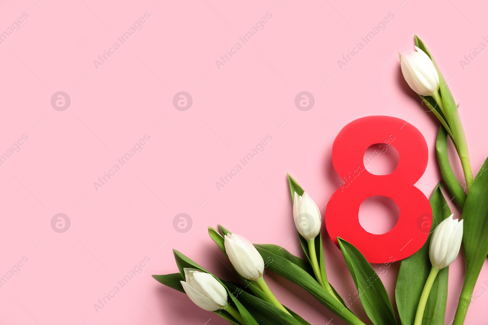 Photo of 8 March card design with tulips and space for text on pink background, flat lay. International Women's Day