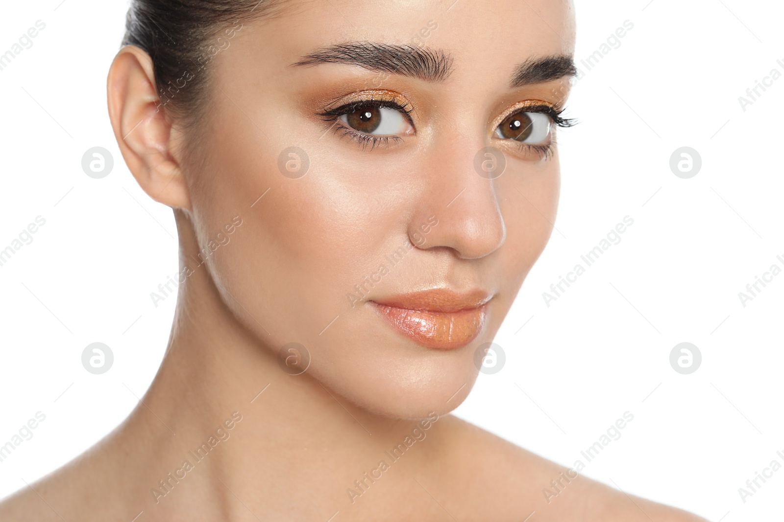 Photo of Beautiful young woman with glitter makeup on white background