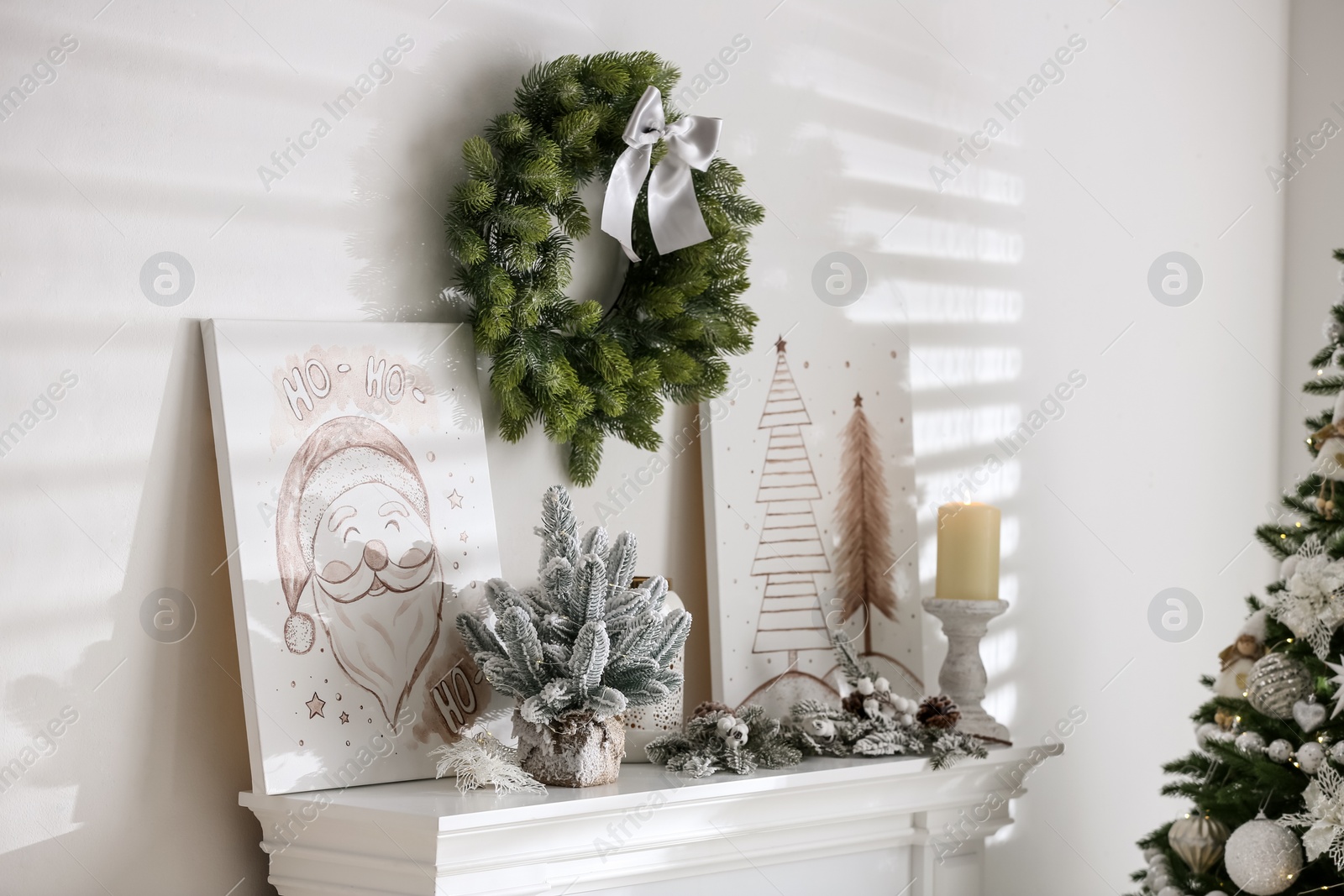 Photo of Beautiful Christmas pictures in festive room interior