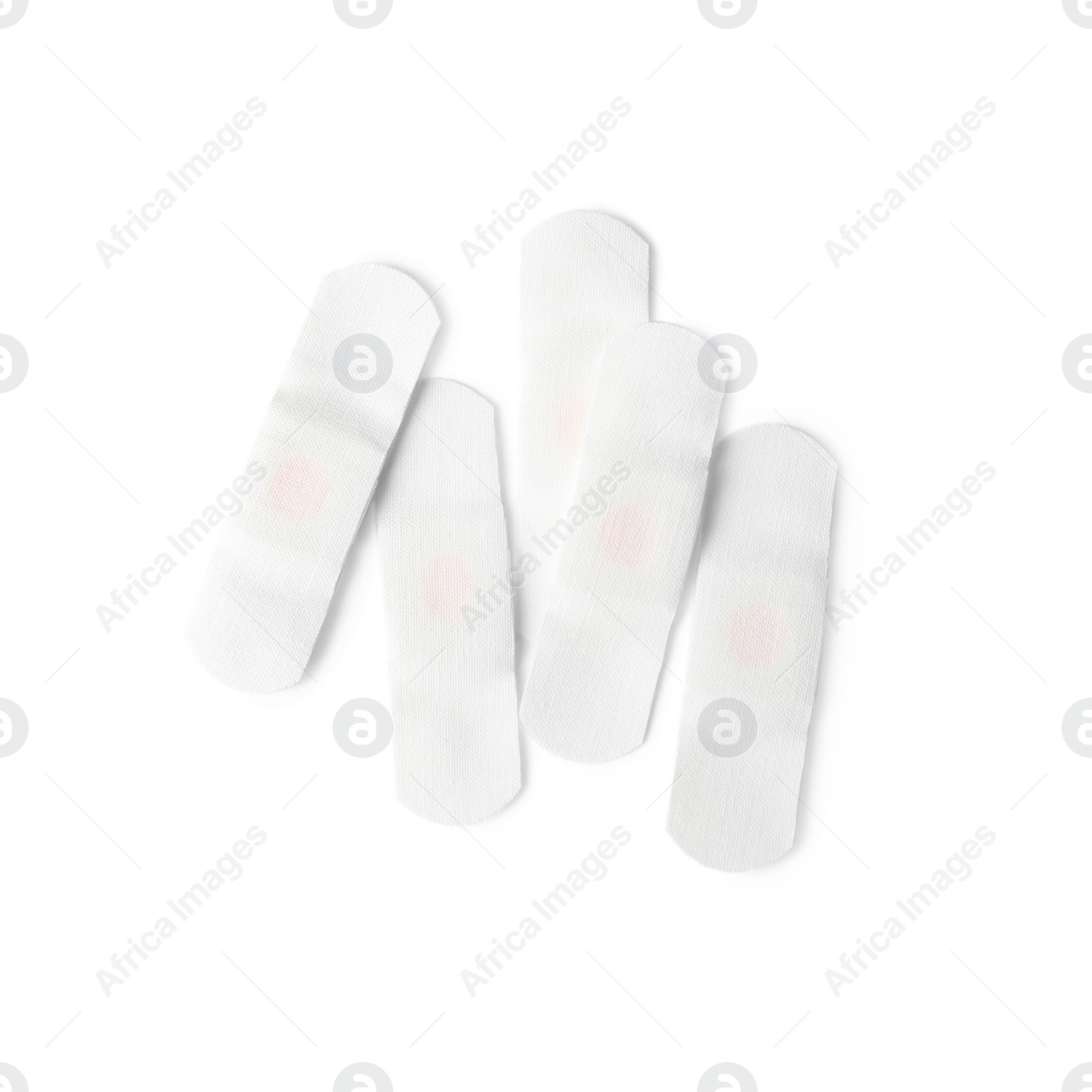 Photo of Medical sticking plasters isolated on white. First aid item