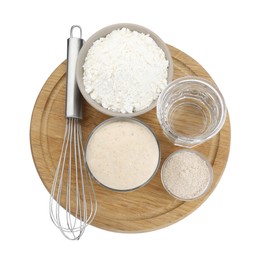 Photo of Leaven, water, whisk and flour isolated on white, top view
