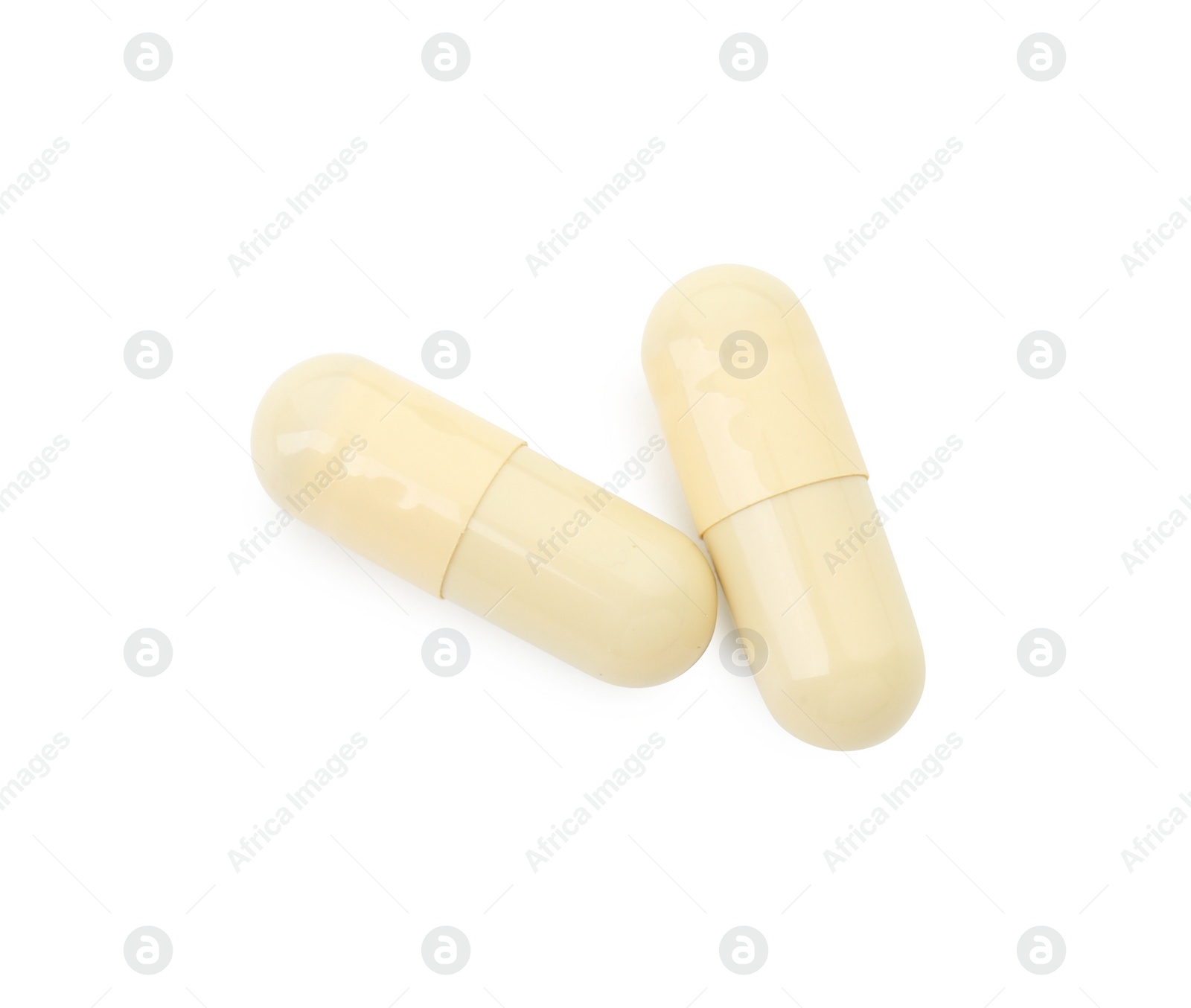 Photo of Vitamin capsules isolated on white, top view. Health supplement