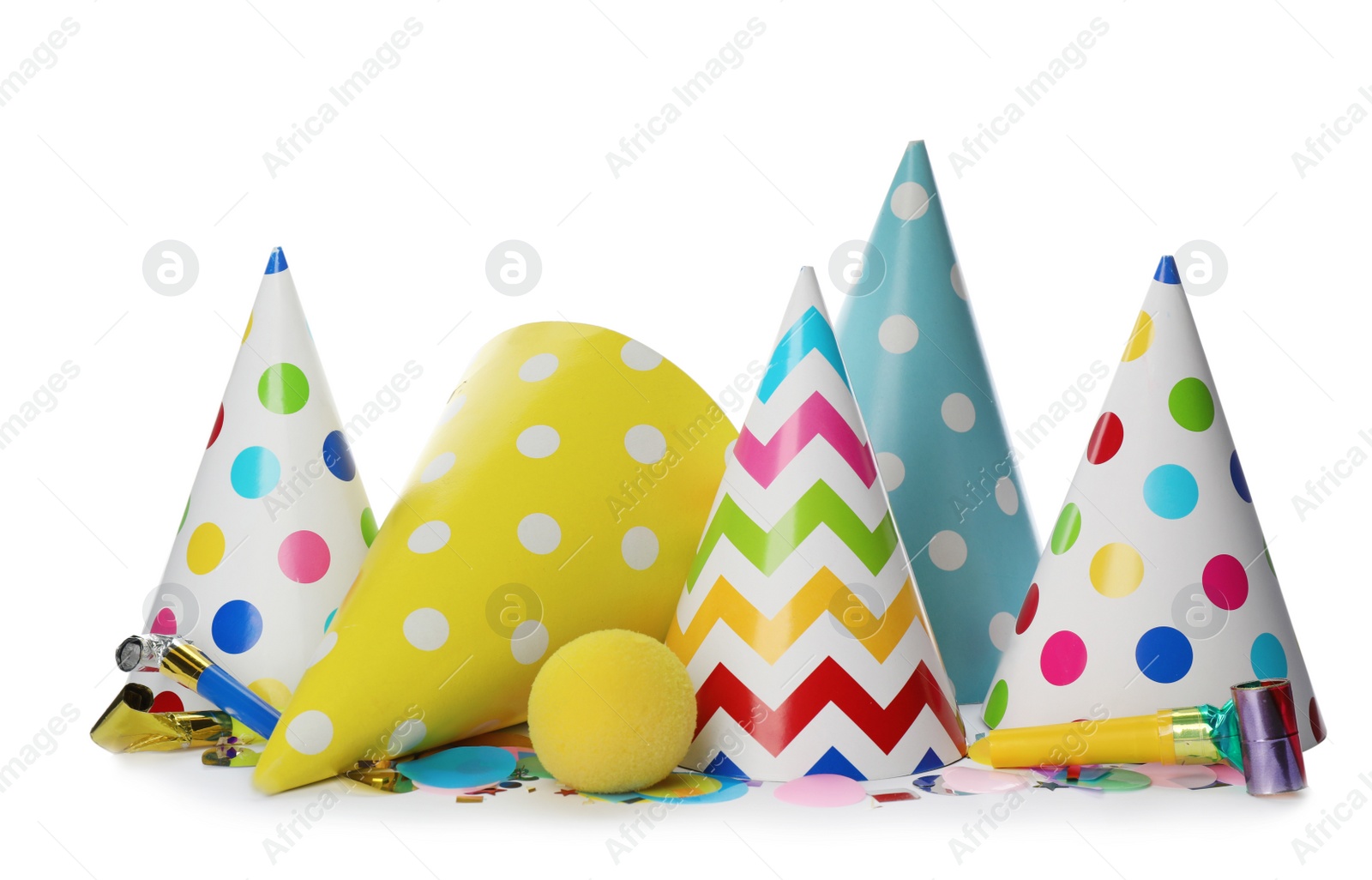 Photo of Colorful party hats and other festive items on white background