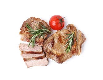 Delicious fried meat with rosemary and tomato on white background, top view