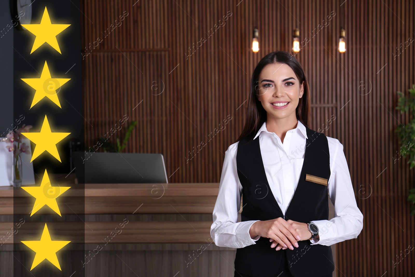 Image of Five Star Luxury Hotel. Portrait of receptionist in lobby