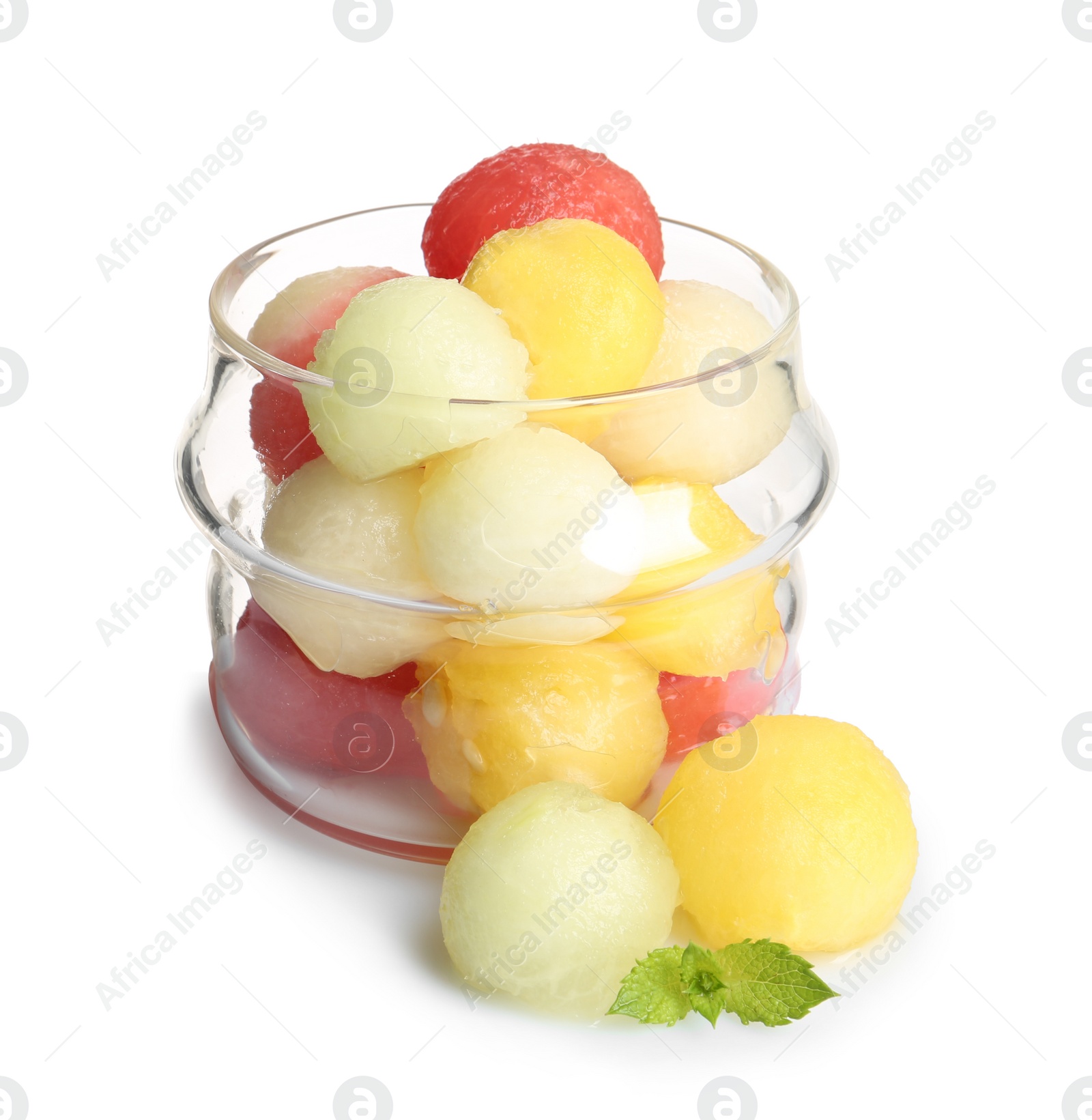 Photo of Glass dish of melon and watermelon balls with mint on white background