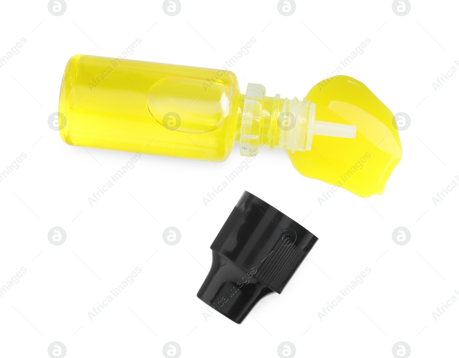 Photo of Bottle of yellow food coloring on white background, top view