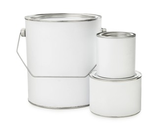 Set of different paint cans on white background. Mockup for design