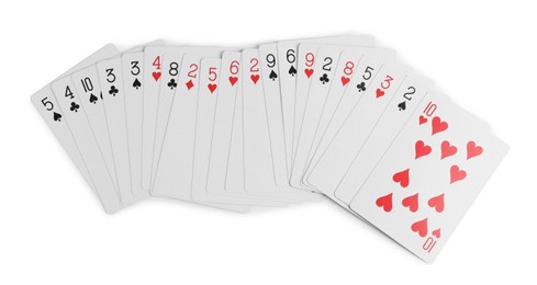 Photo of Many different playing cards on white background, top view
