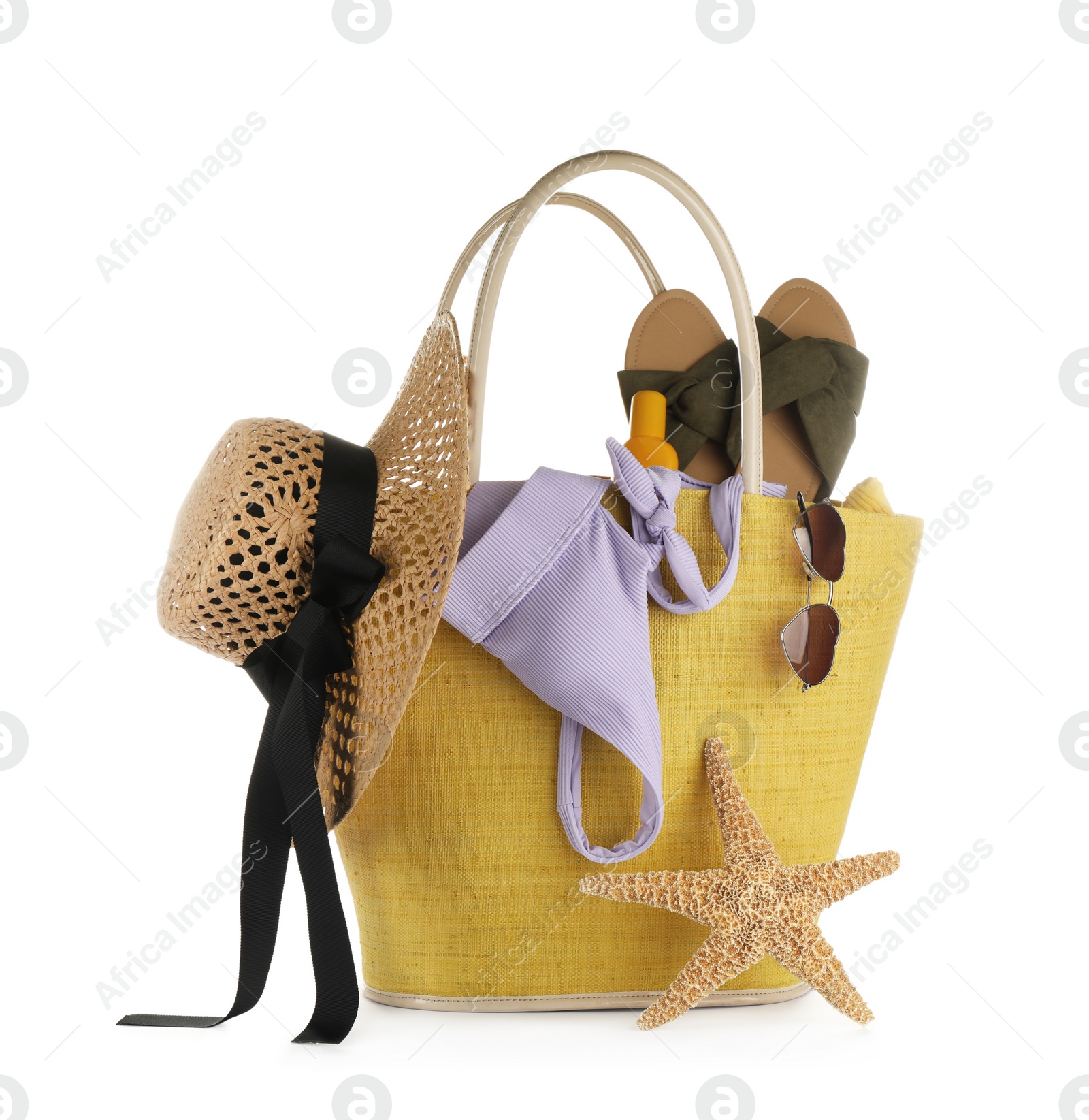 Photo of Different stylish beach accessories on white background