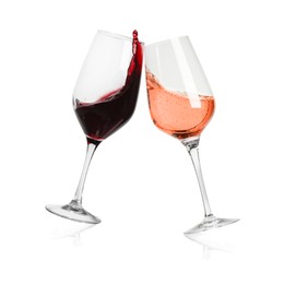 Image of Different types of wine splashing in glasses on white background