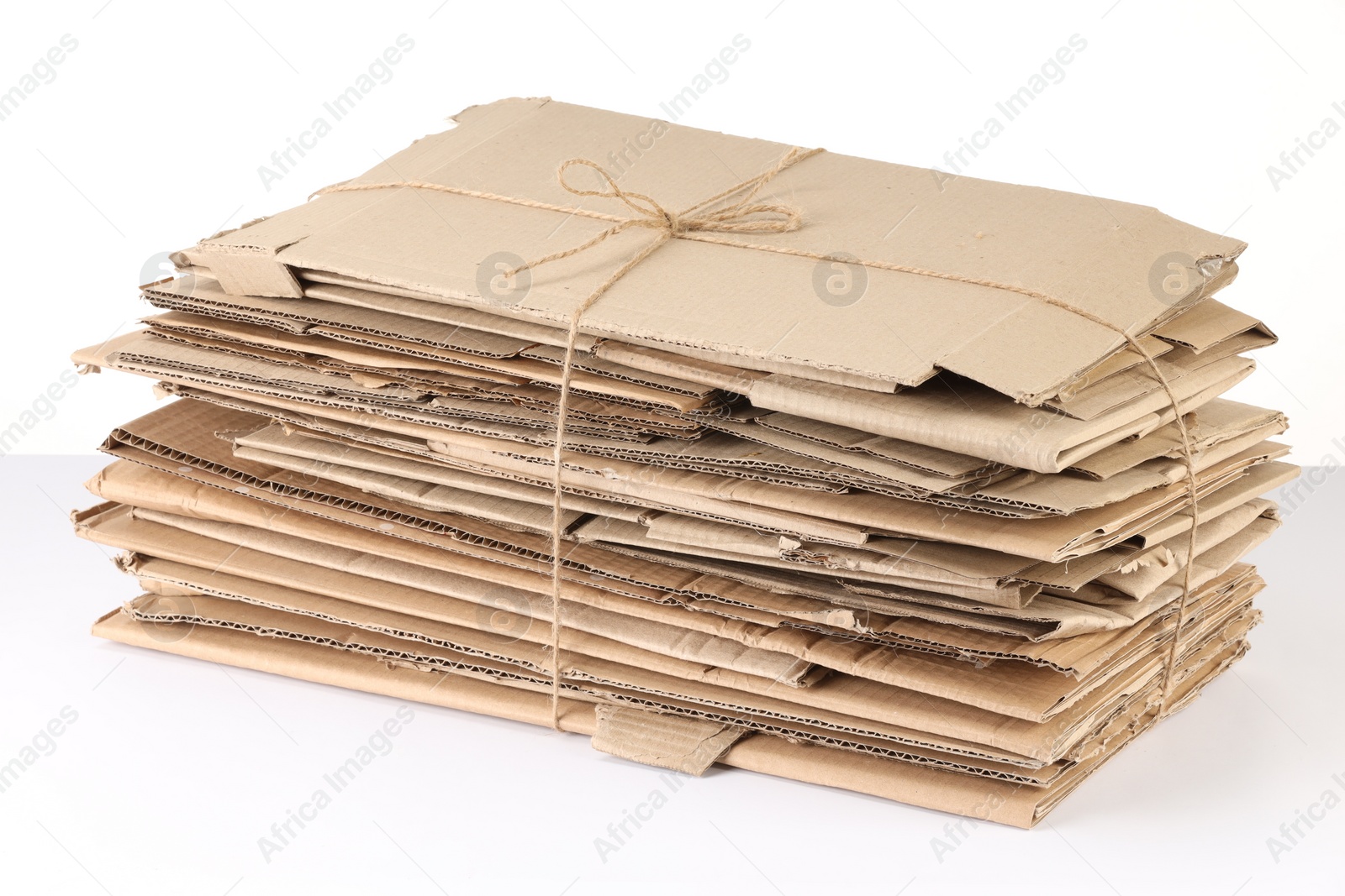 Photo of Stack of cardboard pieces isolated on white