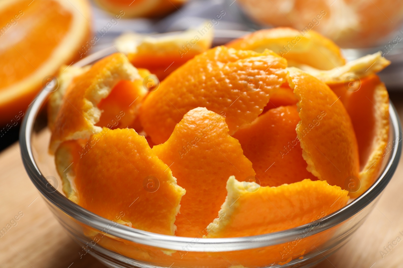 Photo of Orange peels preparing for drying on wooden board, closeup