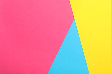 Colorful paper sheets as background, top view