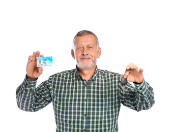 Photo of Happy mature man with driving license and car key on white background
