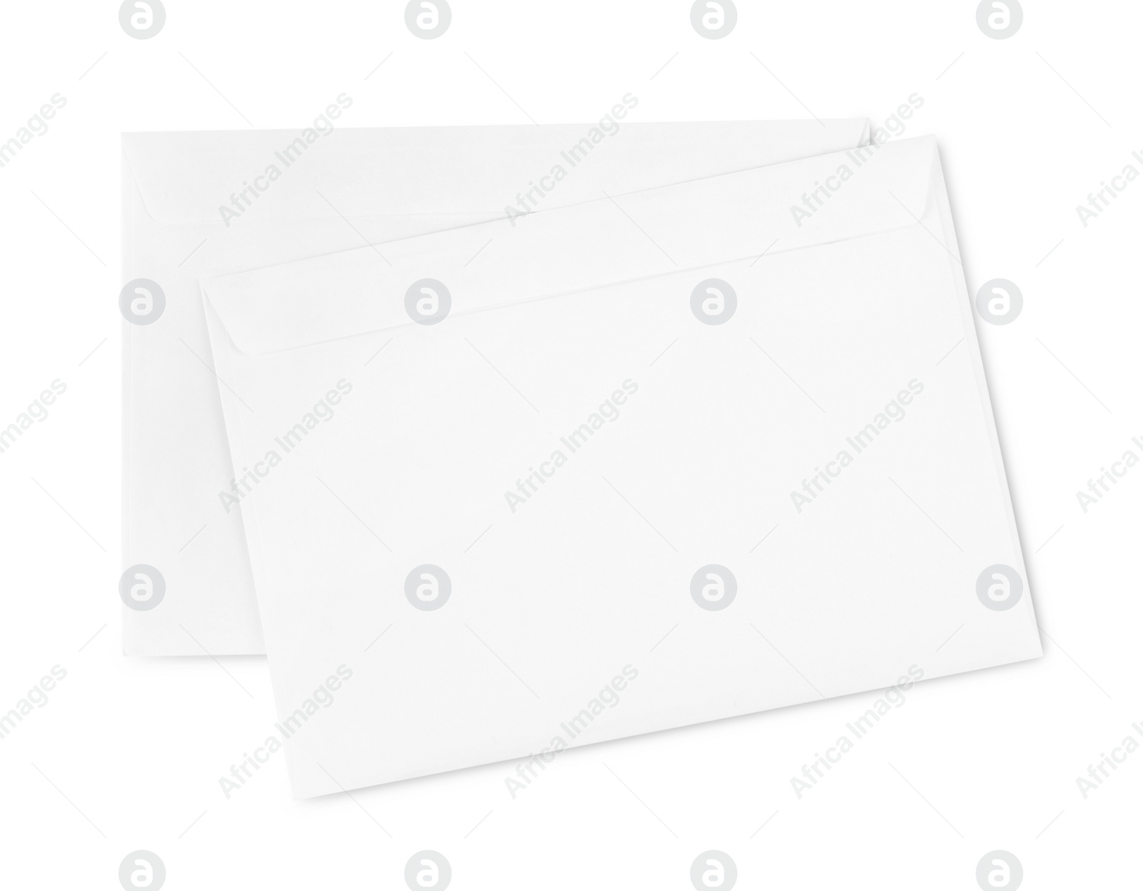 Photo of Two letters on white background, top view