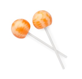 Photo of Two sweet colorful lollipops isolated on white, top view