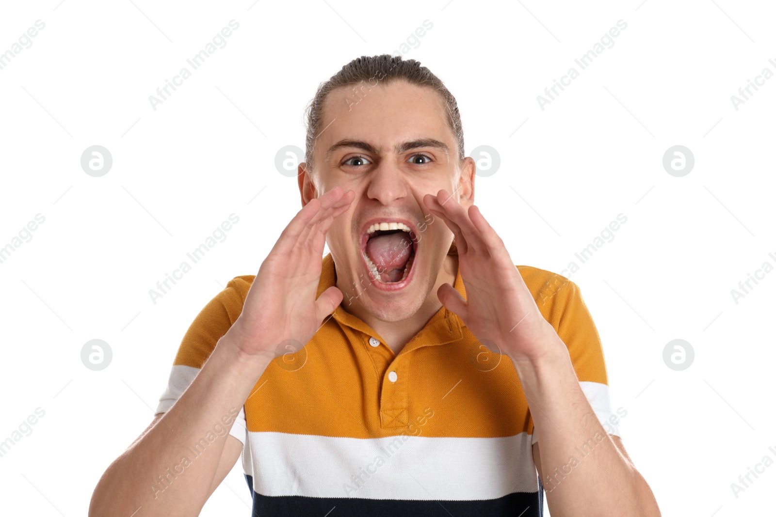 Photo of Portrait of angry young man on white background