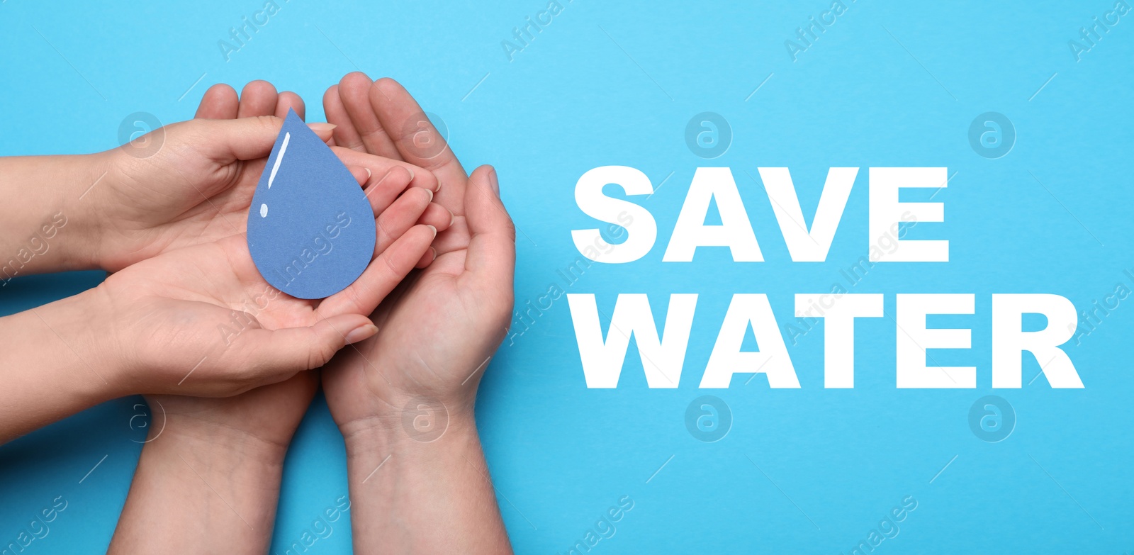 Image of Save Water concept. Man and woman holding paper drop on light blue background, top view