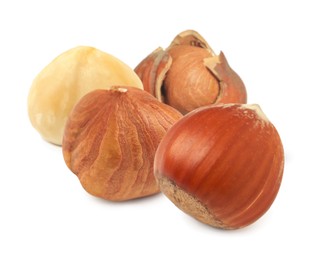 Tasty organic hazelnuts on white background. Healthy snack