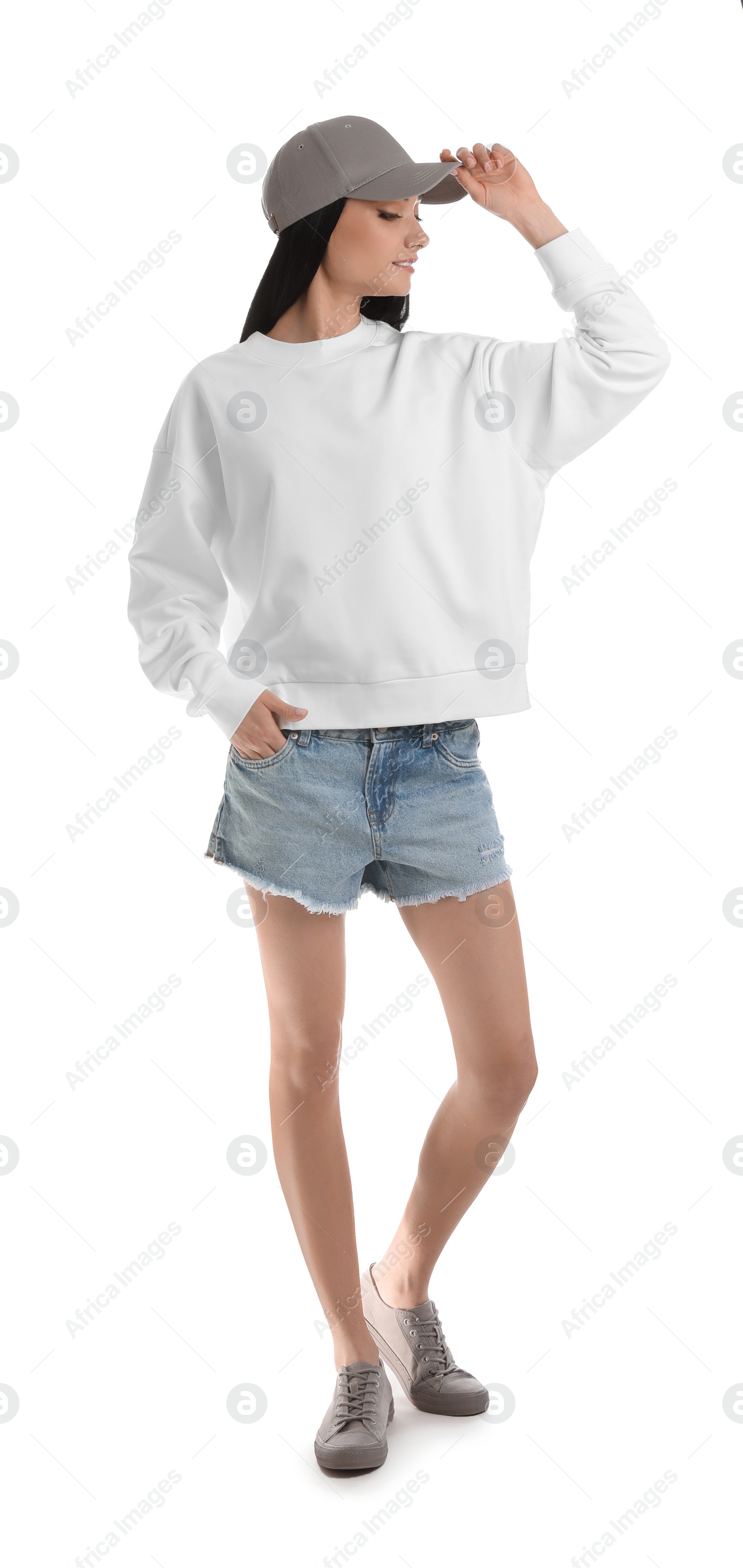 Photo of Full length portrait of young woman in sweater isolated on white. Mock up for design