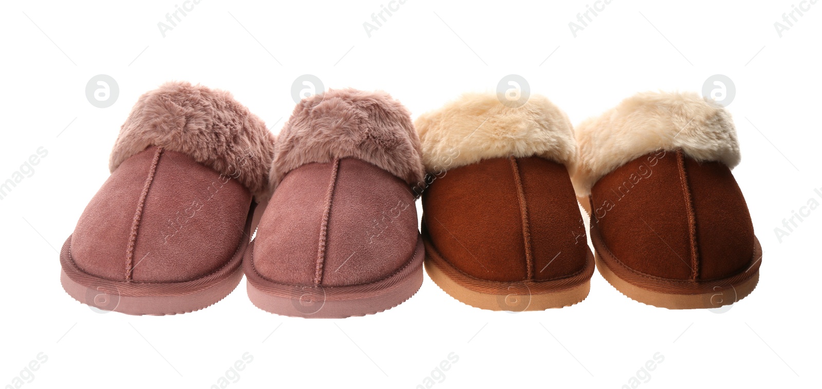 Photo of Different stylish soft slippers on white background