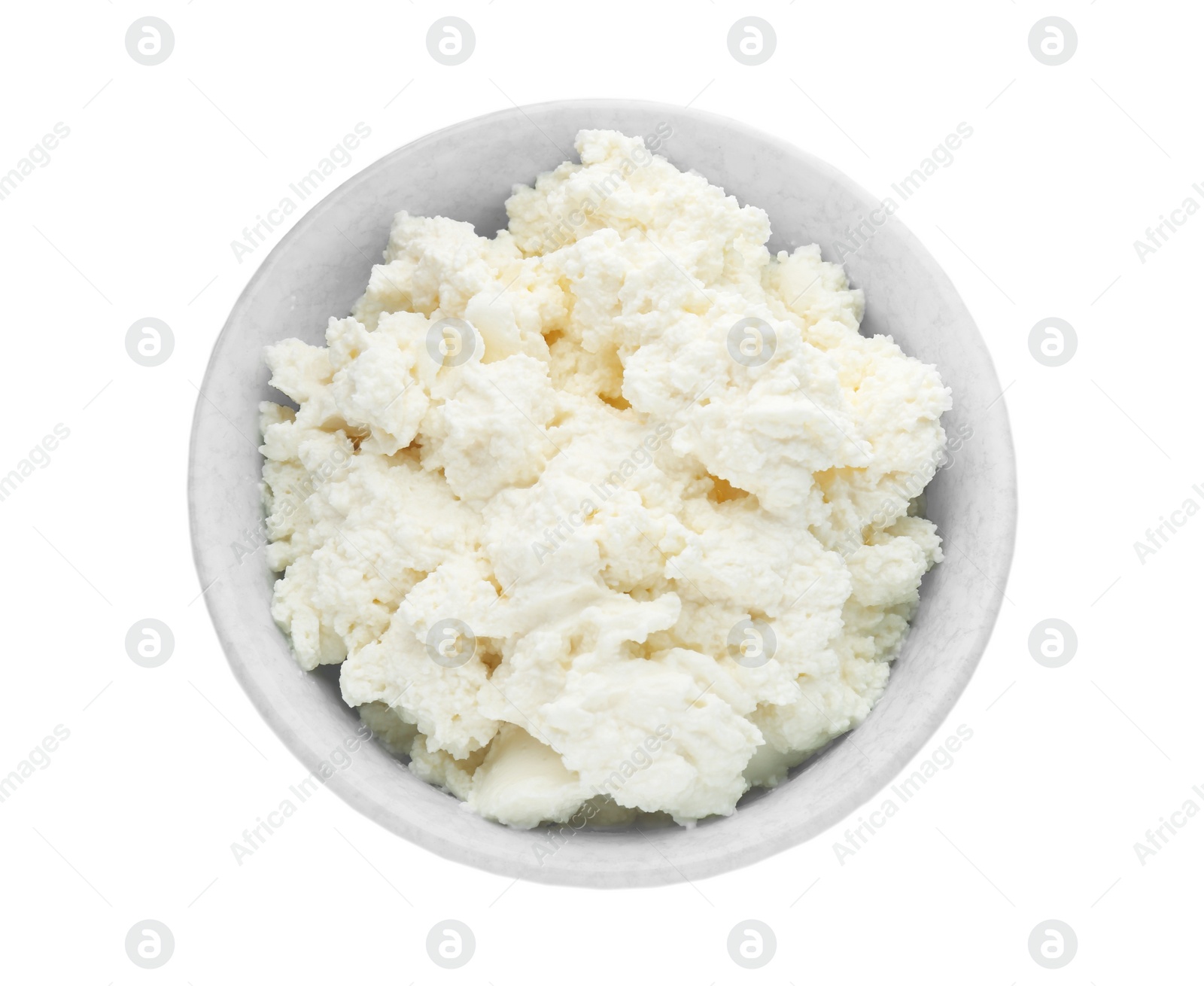 Photo of Delicious tofu cream cheese in bowl isolated on white, top view