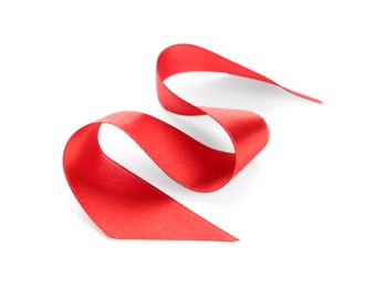 Simple red ribbon on white background. Festive decoration