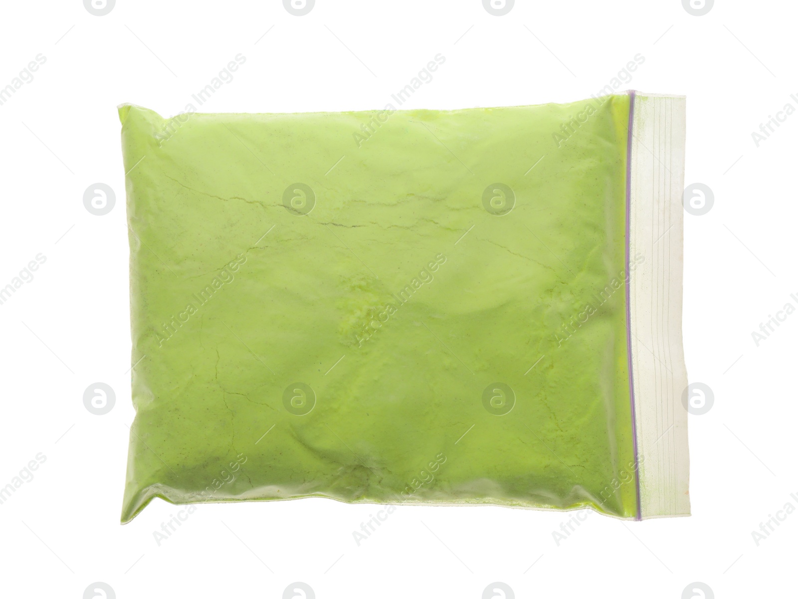 Photo of Light green powder in plastic bag isolated on white, top view. Holi festival celebration