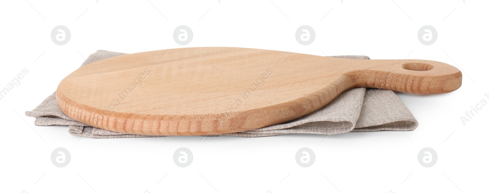 Photo of Wooden cutting board and napkin isolated on white