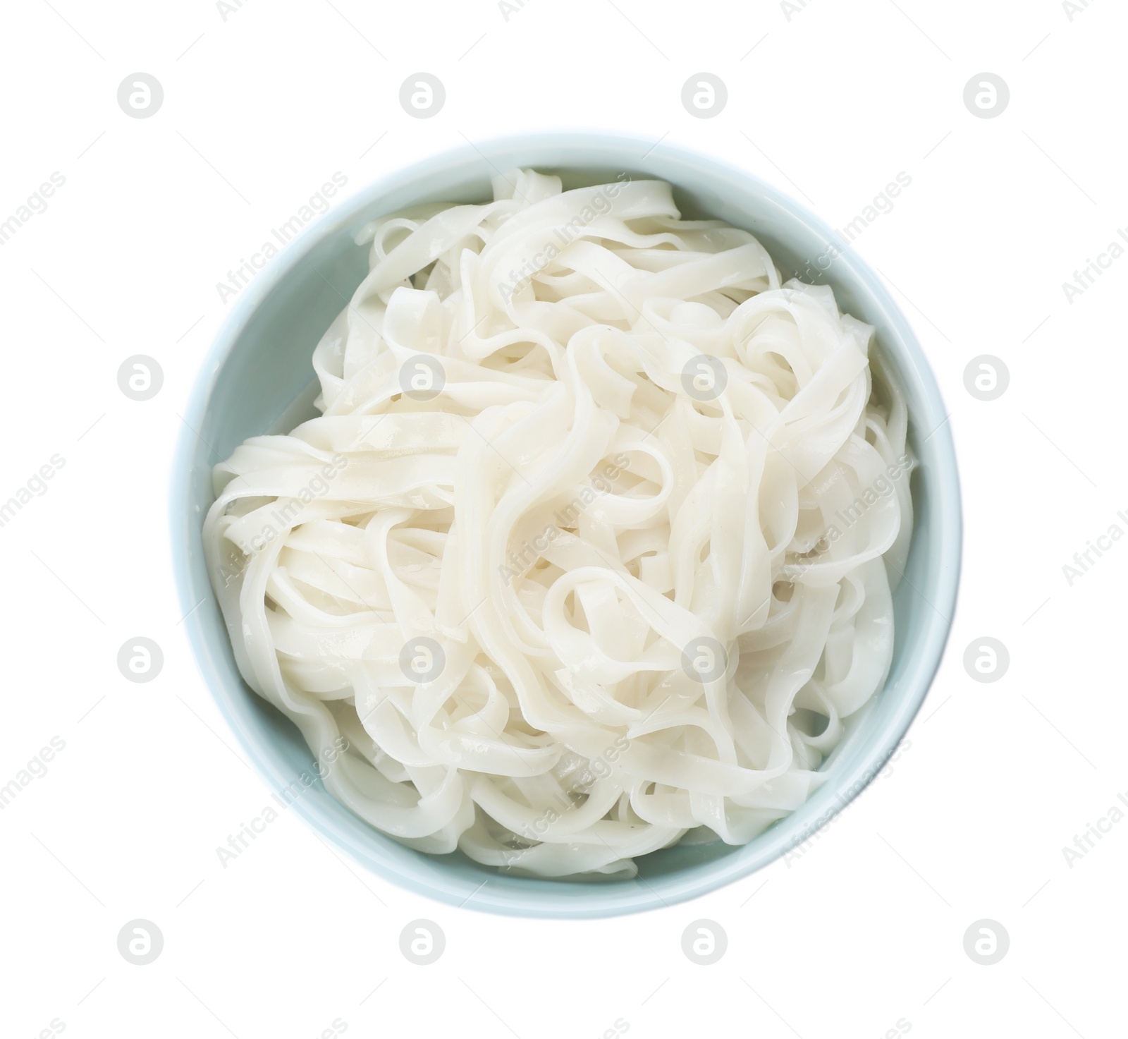 Photo of Bowl of rice noodles on white background, top view