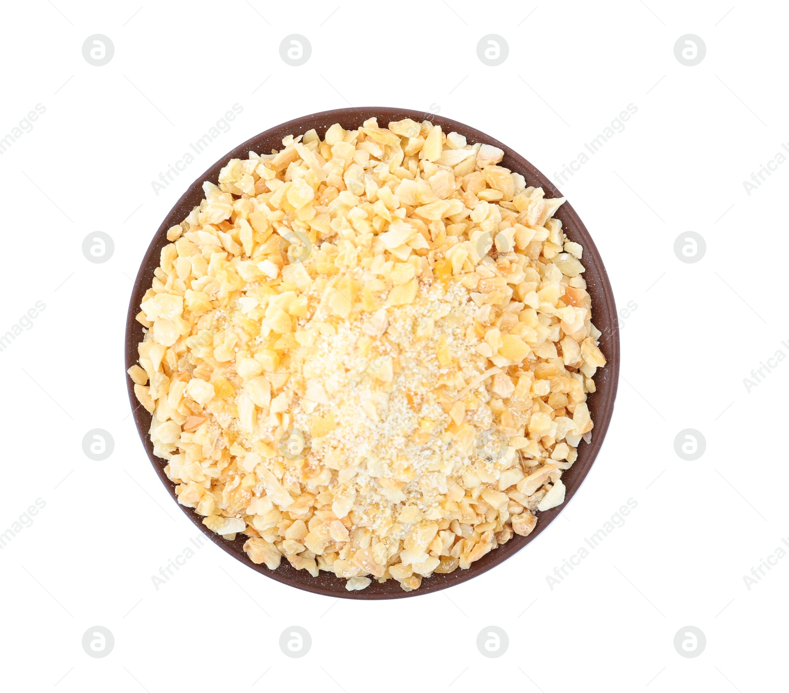 Photo of Bowl of granulated dry garlic on white background, top view