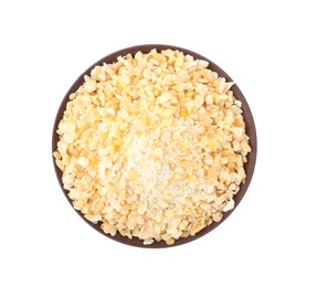 Bowl of granulated dry garlic on white background, top view