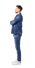 Full length portrait of handsome man posing on white background