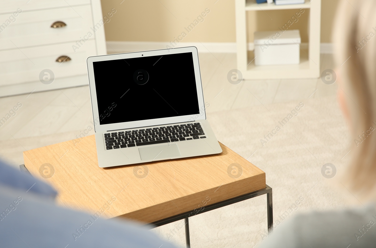 Photo of Couple using video chat on laptop at home, closeup. Space for text