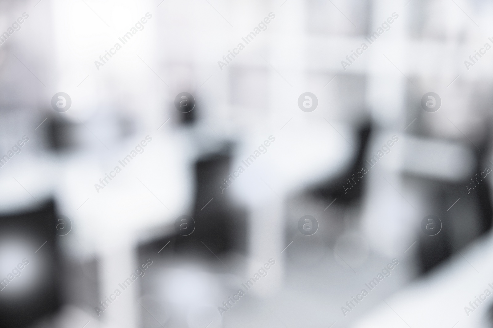 Image of Office interior. Blurred view of comfortable workspace