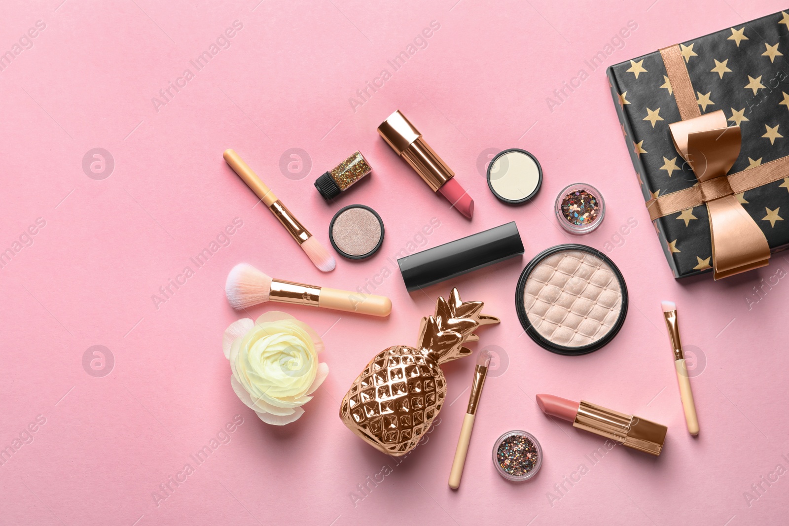 Photo of Flat lay composition with decorative cosmetics on color background