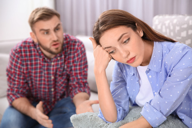 Couple having quarrel at home. Relationship problems