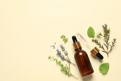 Photo of Bottle of essential oil, pipette and different herbs on beige background, flat lay. Space for text