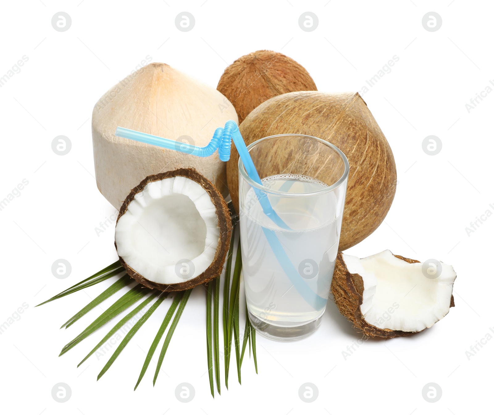 Photo of Glass of coconut milk and nuts on white background