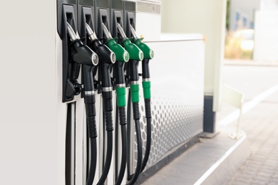 Photo of Gasoline pump at modern gas filling station