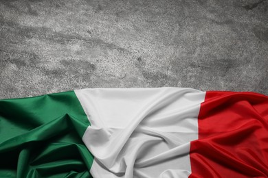 Photo of Flag of Italy on gray background, top view. Space for text