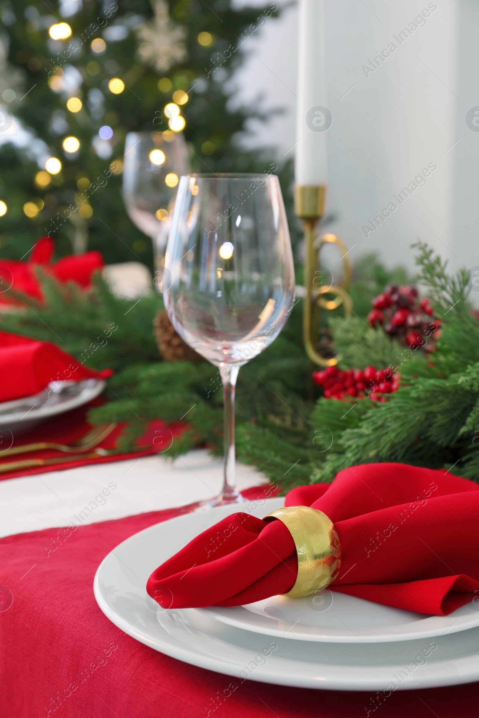 Photo of Beautiful table setting with Christmas decor indoors