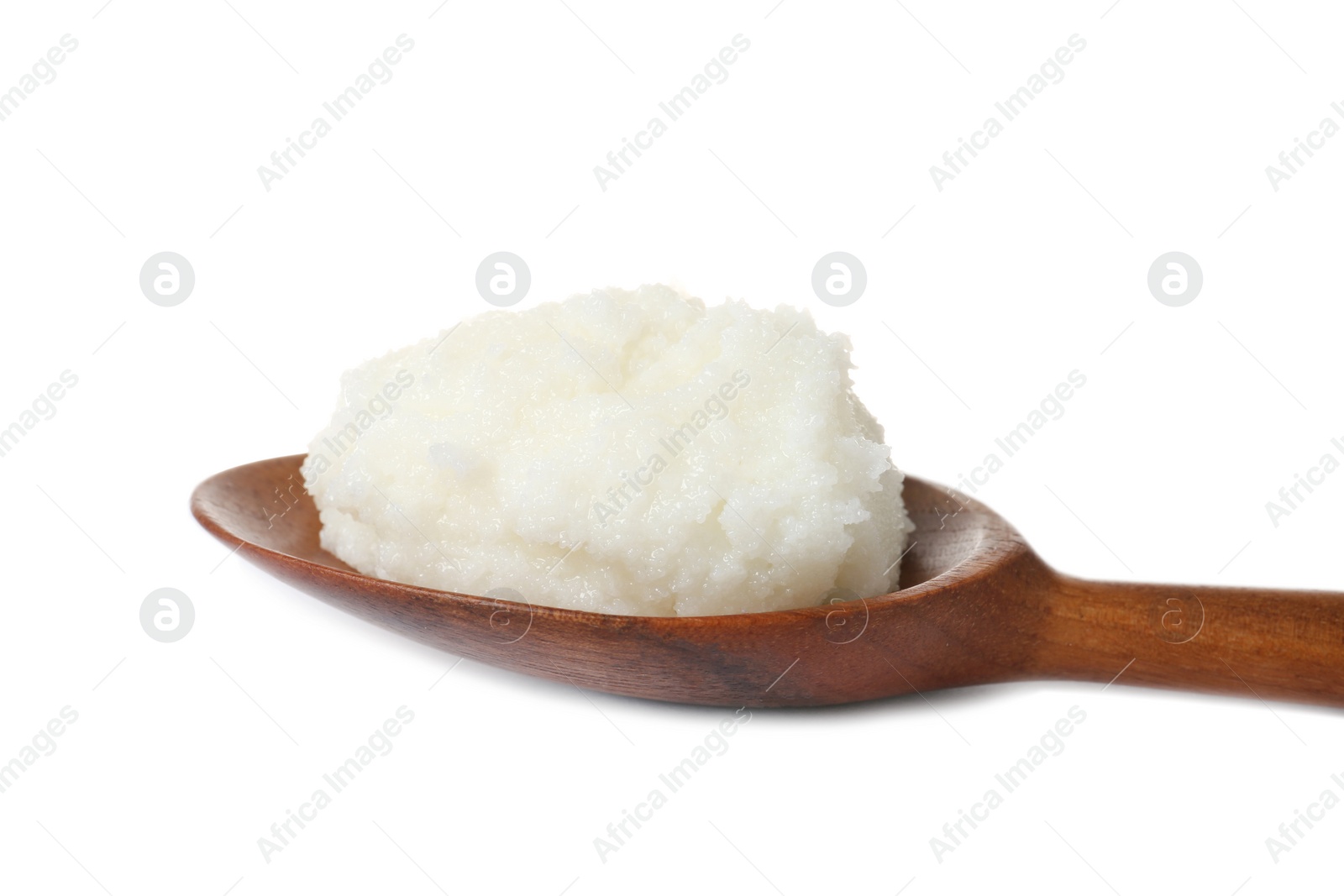 Photo of Shea butter in wooden spoon isolated on white