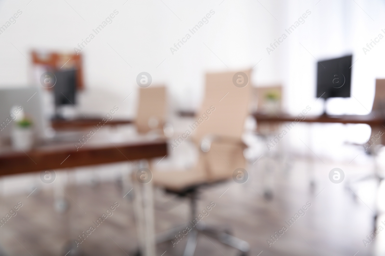 Photo of Modern brightly lit office with bokeh effect