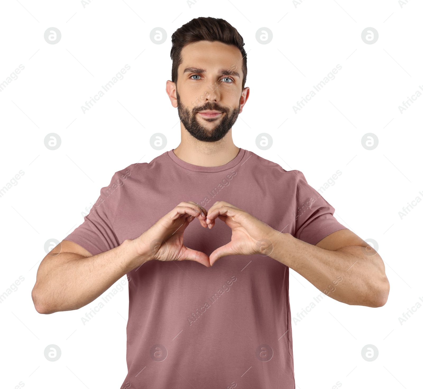 Photo of Man making heart with hands on white background