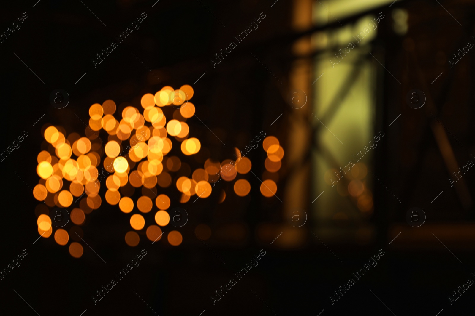 Photo of Beautiful street lights at night. Bokeh effect