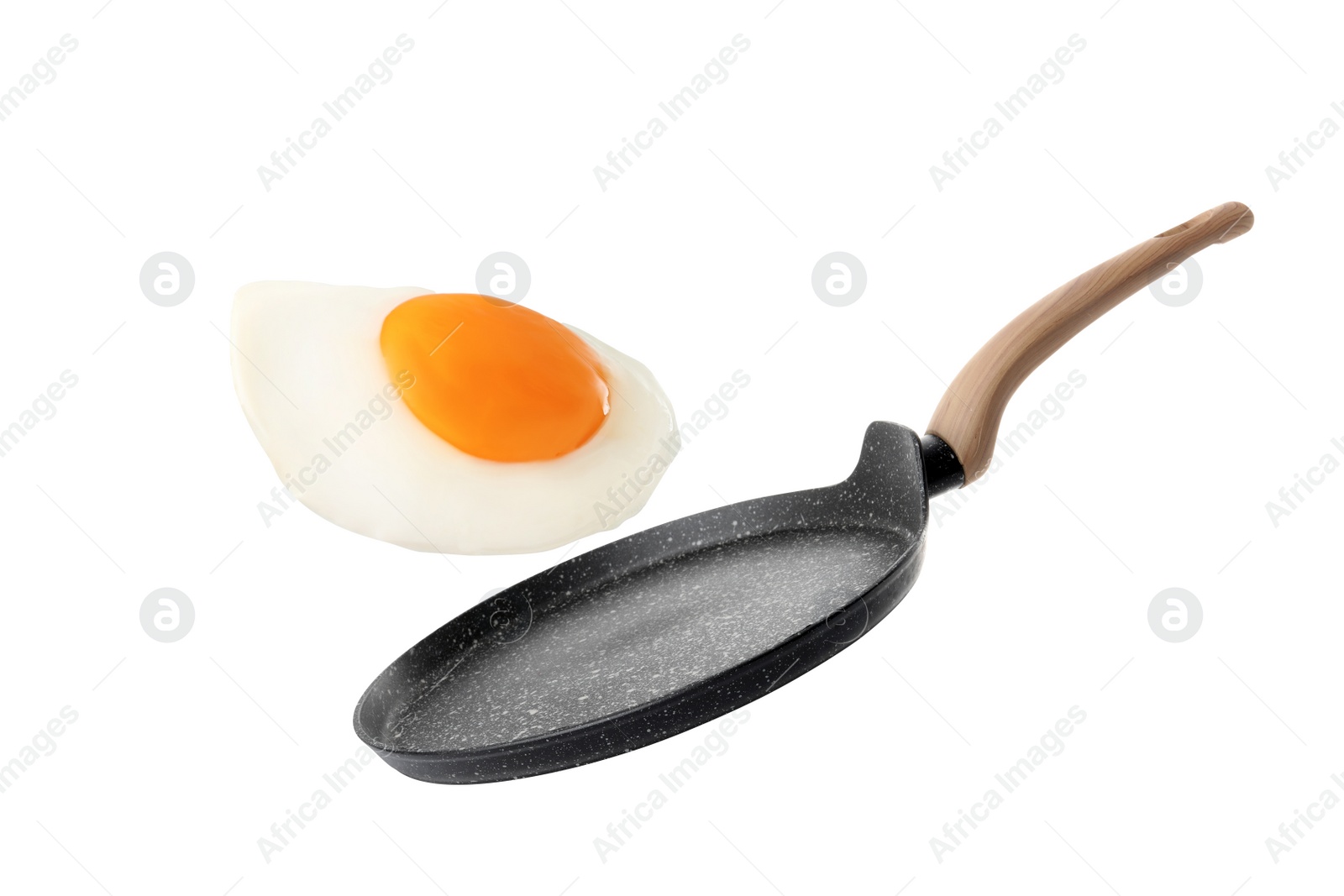 Image of Tasty fried chicken egg falling into frying pan on white background