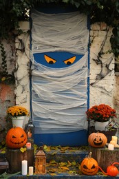Yard entrance decorated for traditional Halloween celebration